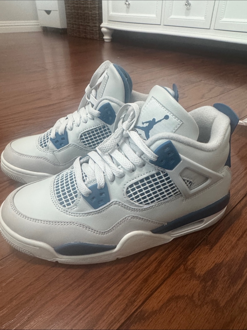 Air Jordan 4 White and Blue Retro Basketball Sneakers - Picture 3 of 11